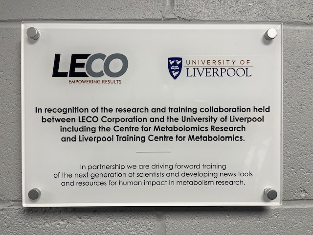 A white plaque that commemorates the LECO and University of Liverpool collaboration.